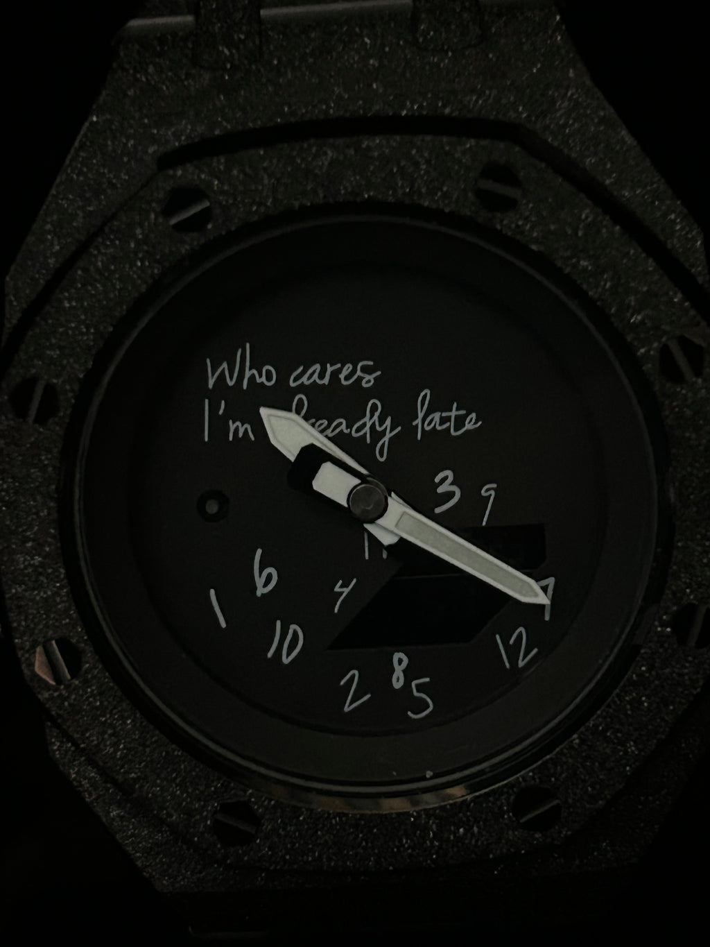 Close-up of frosted black stainless steel case and bracelet