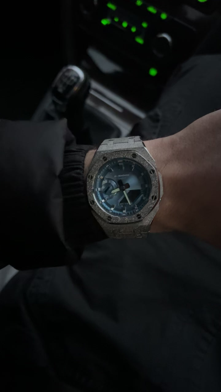 Luxury frosted blue g shock on wrist 
